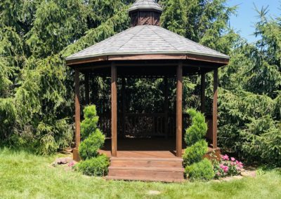 Freshly stained pergola in Des Moines, Iowa