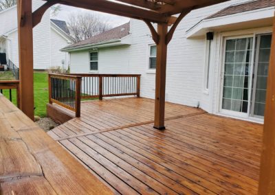 Stained deck with pergola